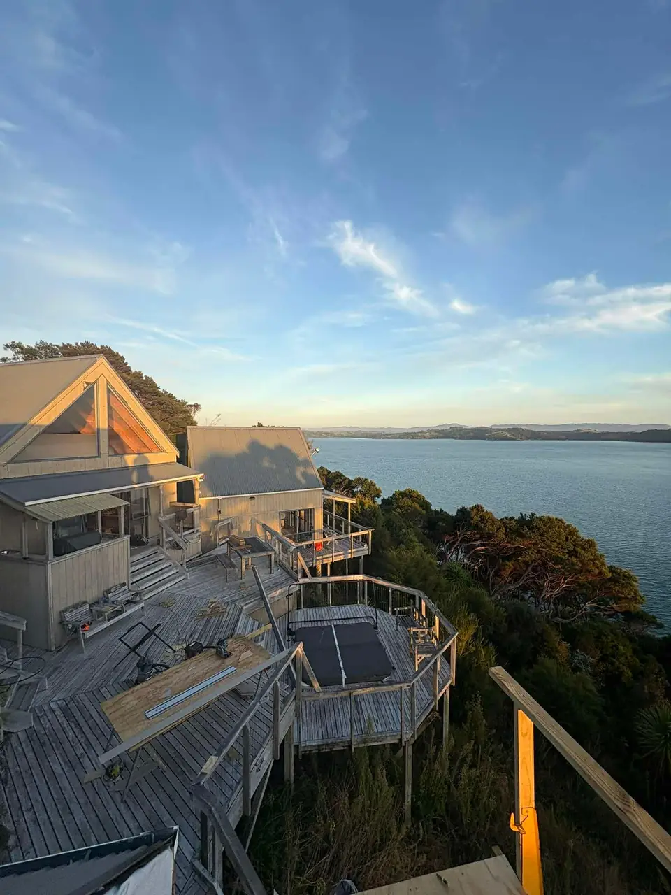 Coastal bach on Kawau Island during the recladding work