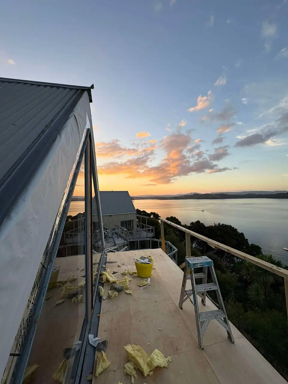 Deck of a bach overlooking the water on Kawau Island