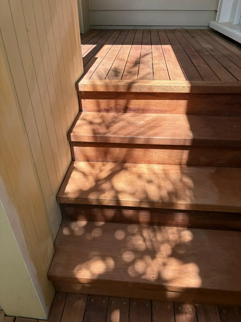 Close up of the rebuilt hardwood porch treads