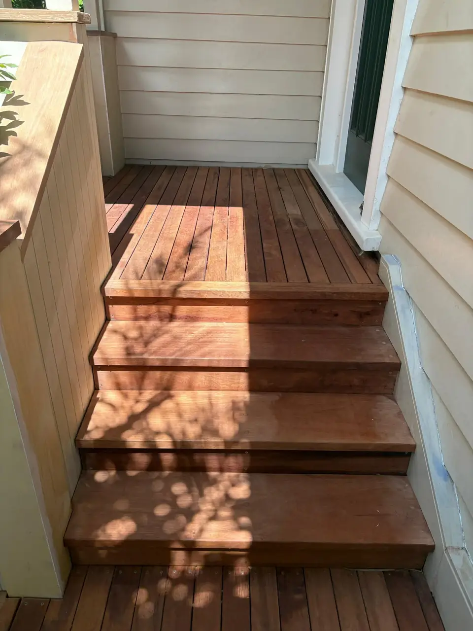 Rebuilt porch steps seen from the top landing
